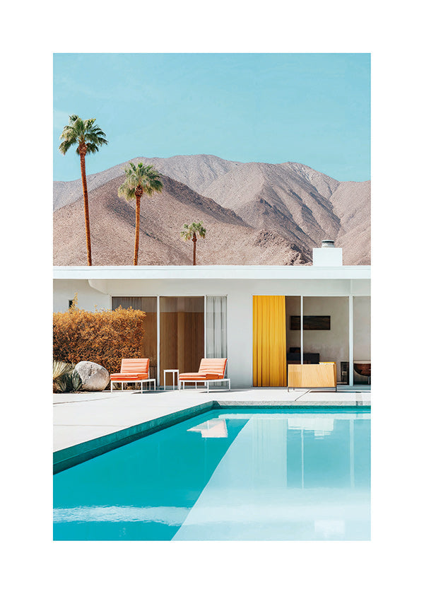 Paysage con piscine et palmiers