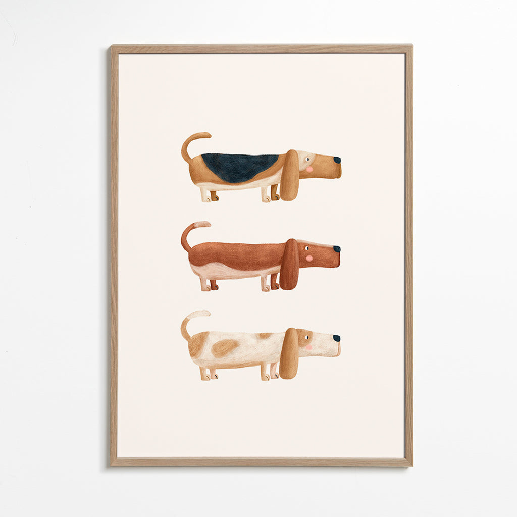Affiche enfantale trois teckels alineados