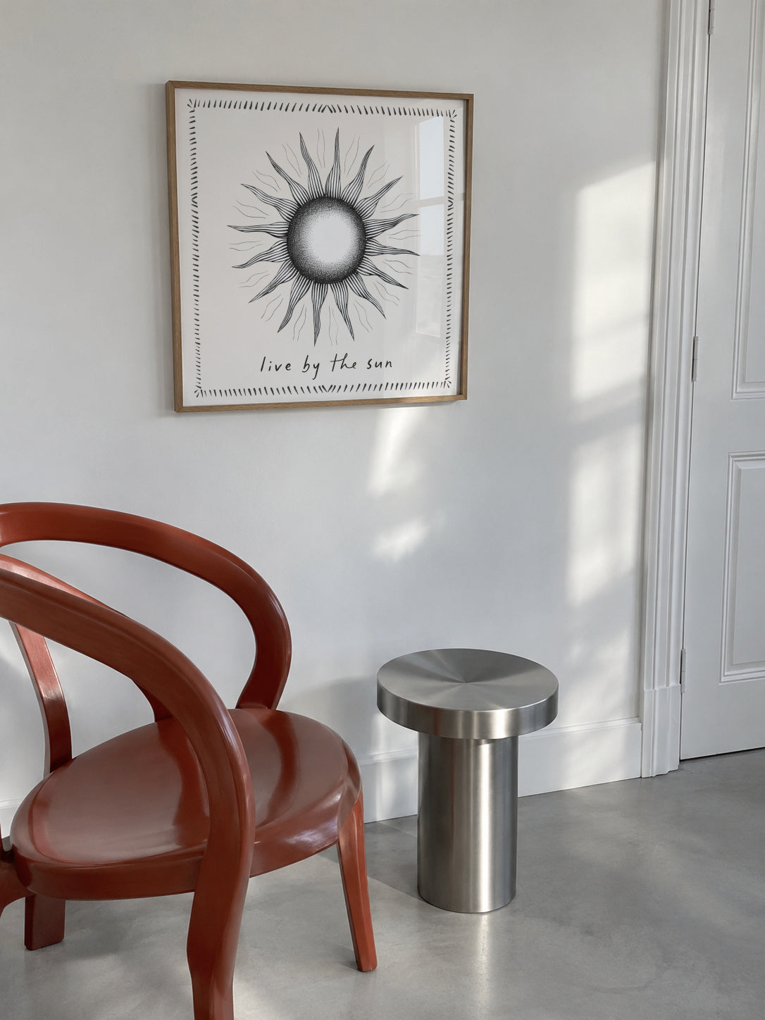 Live by the sun - SQUARE - Framed poster in an interior