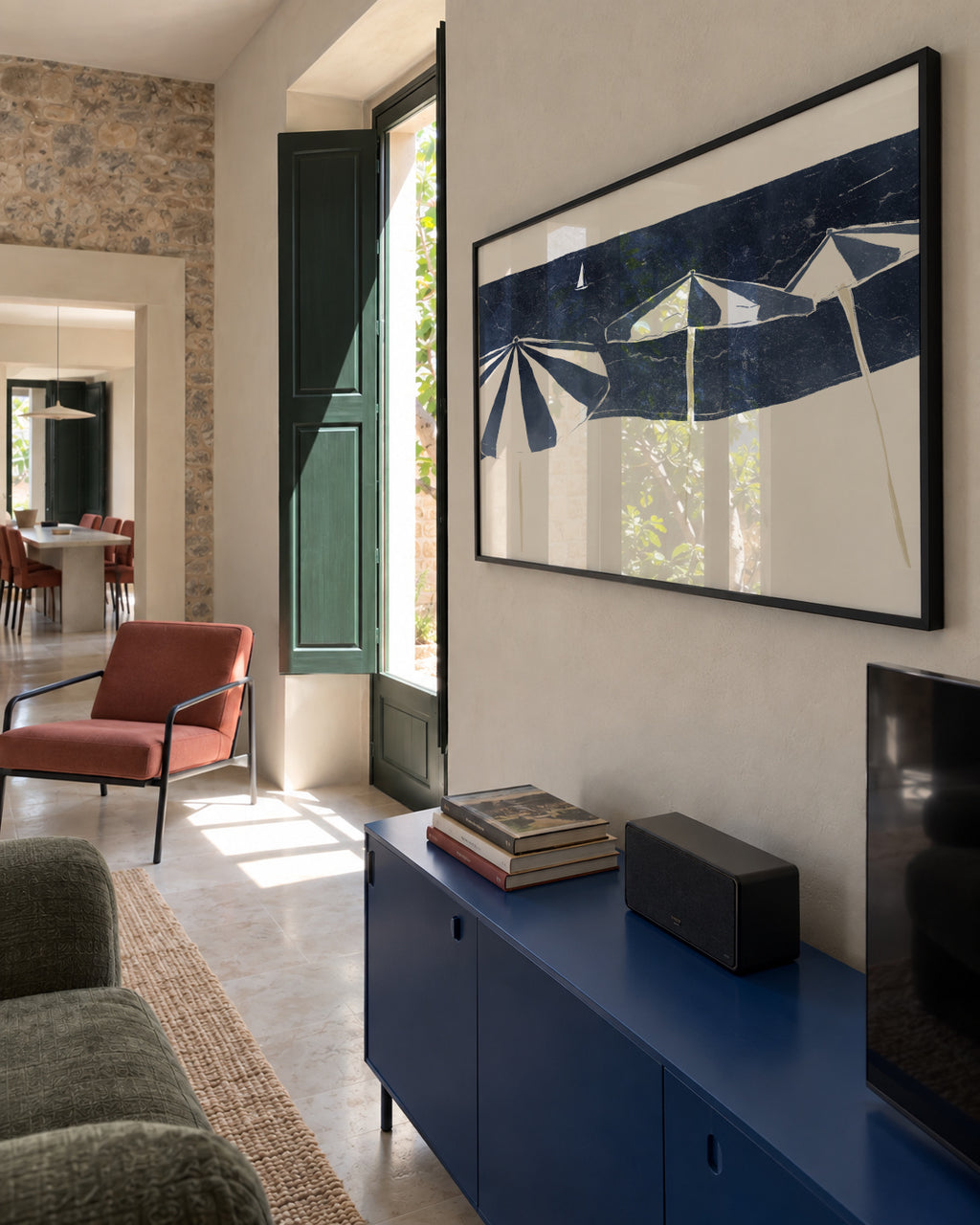 Blue Umbrellas and Sailboat - Framed poster in an interior