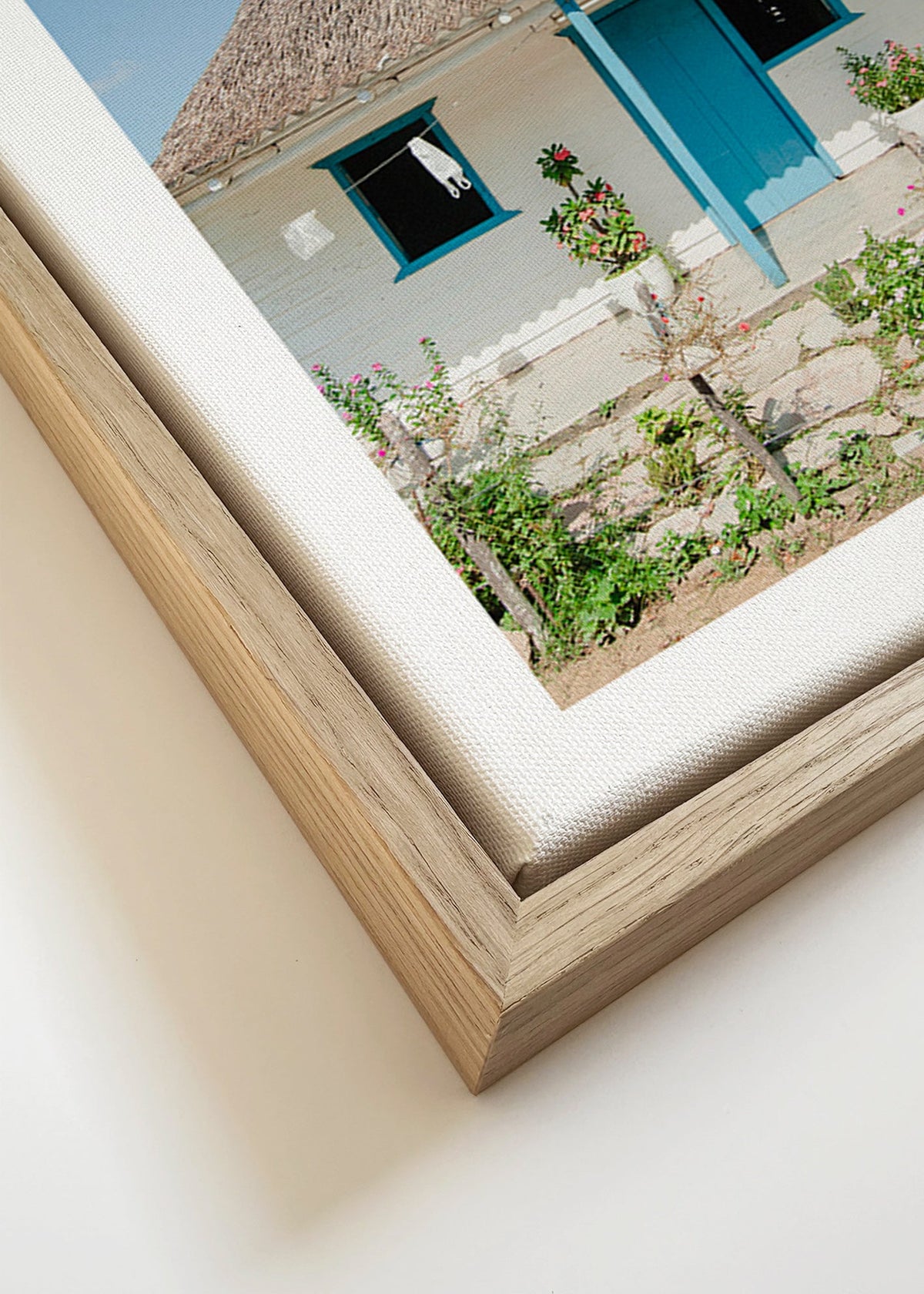 Tableau paysager: maison à porte bleue