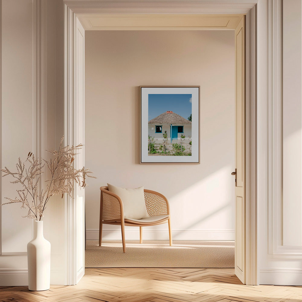 Tableau paysager: maison à porte bleue