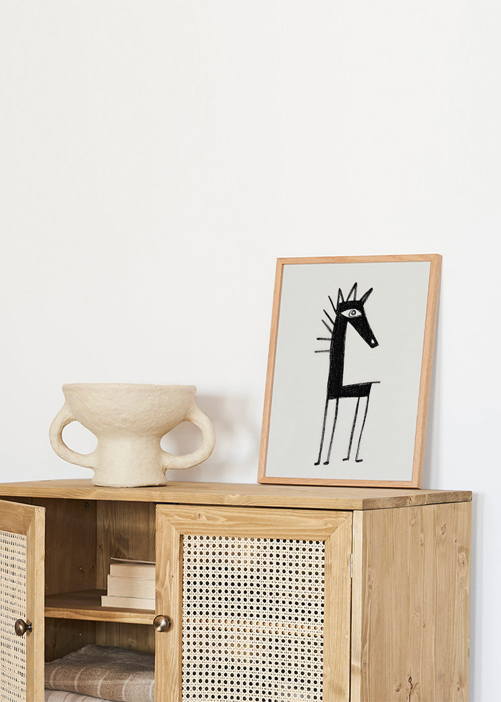 Œuvre créature minimaliste en trait