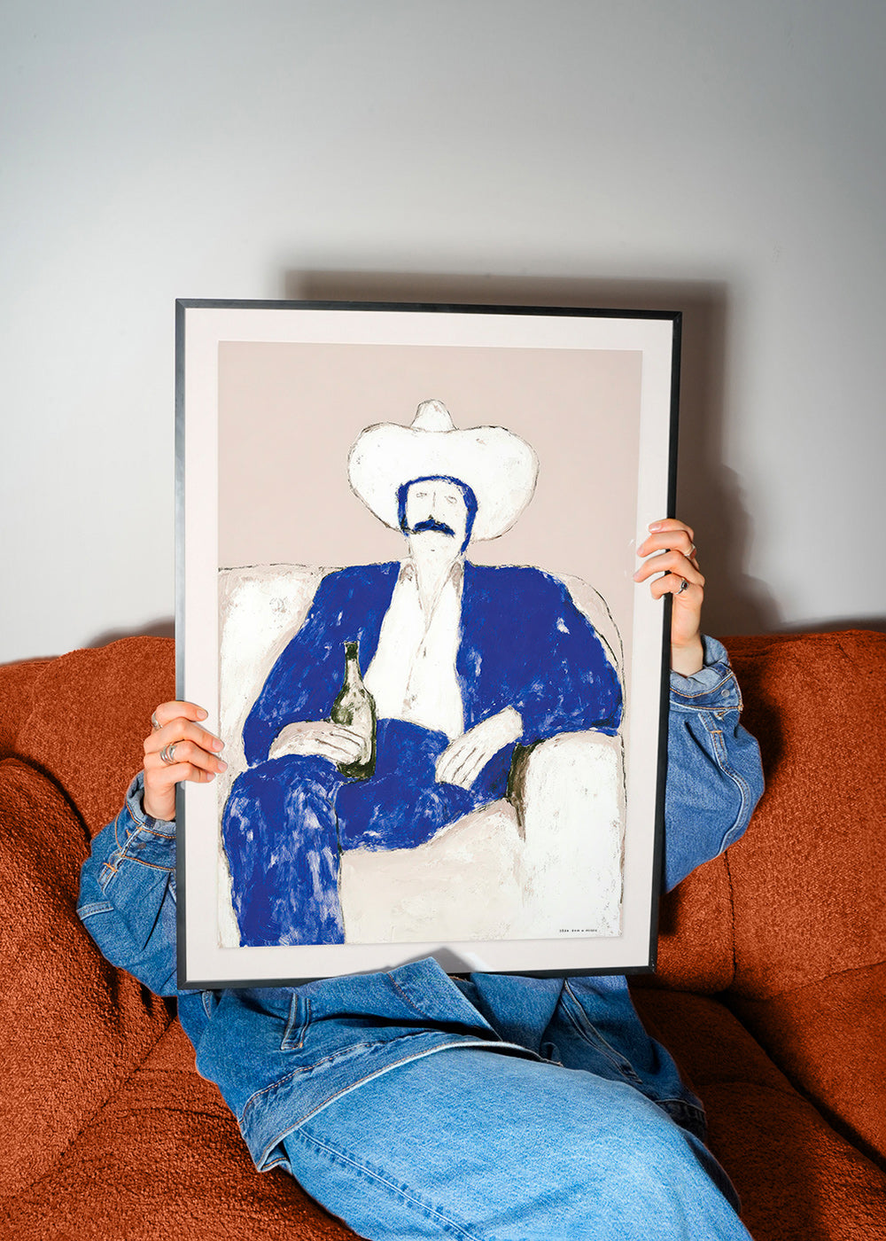 Illustration de cowboy bleu assis