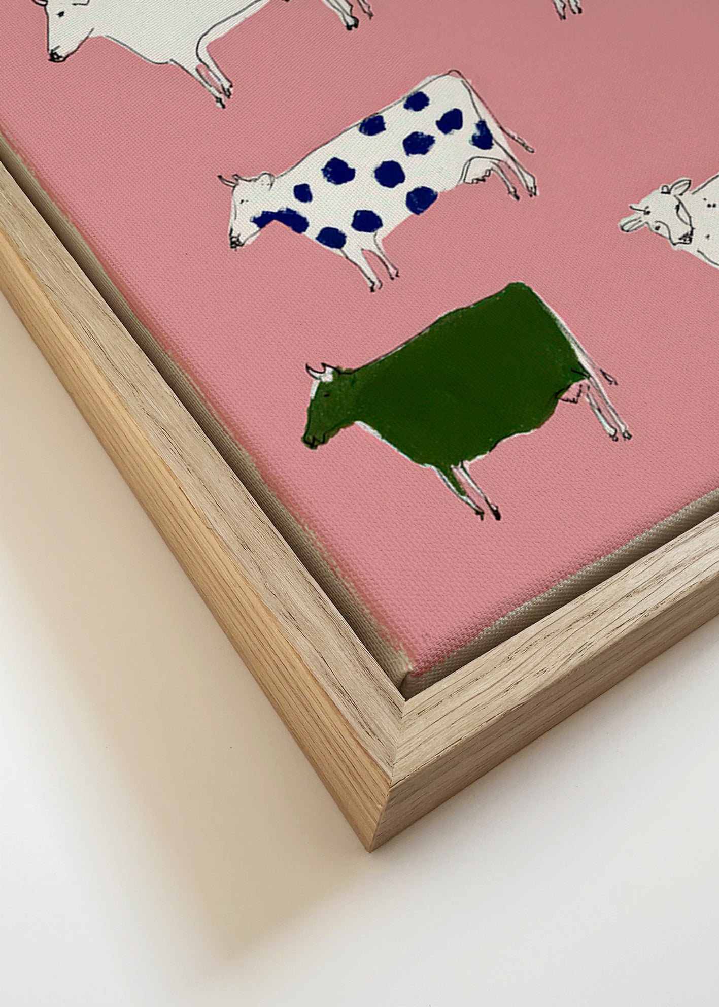 Œuvre de vaches illustrées sur fond rose
