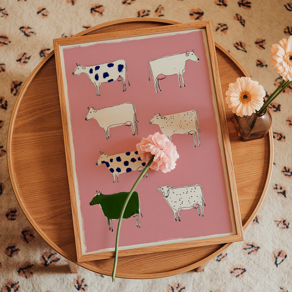 Œuvre de vaches illustrées sur fond rose