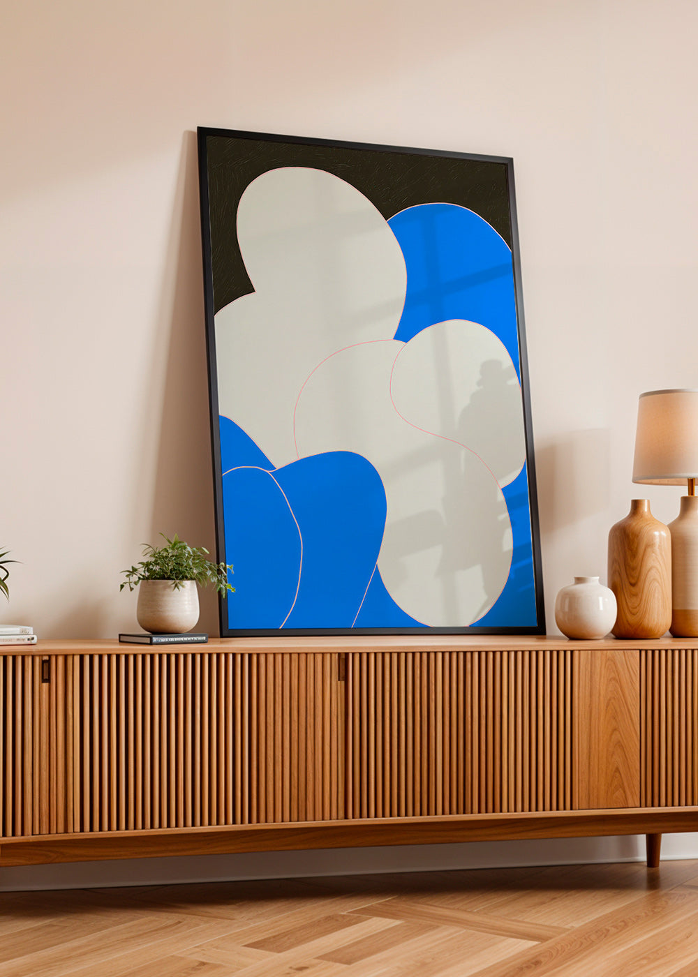 Tableau abstrait aux formes organiques bleu et blanc