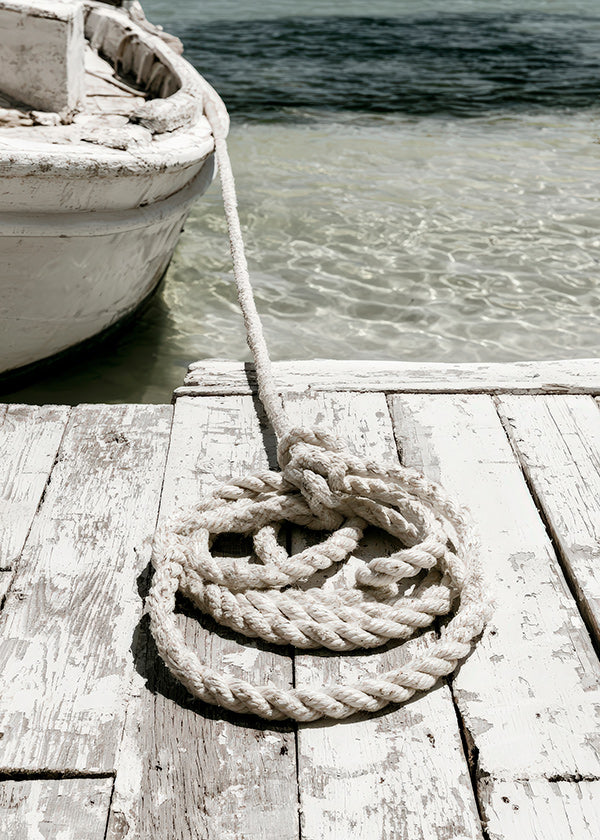 Photographie de ponton et corde au premier plan