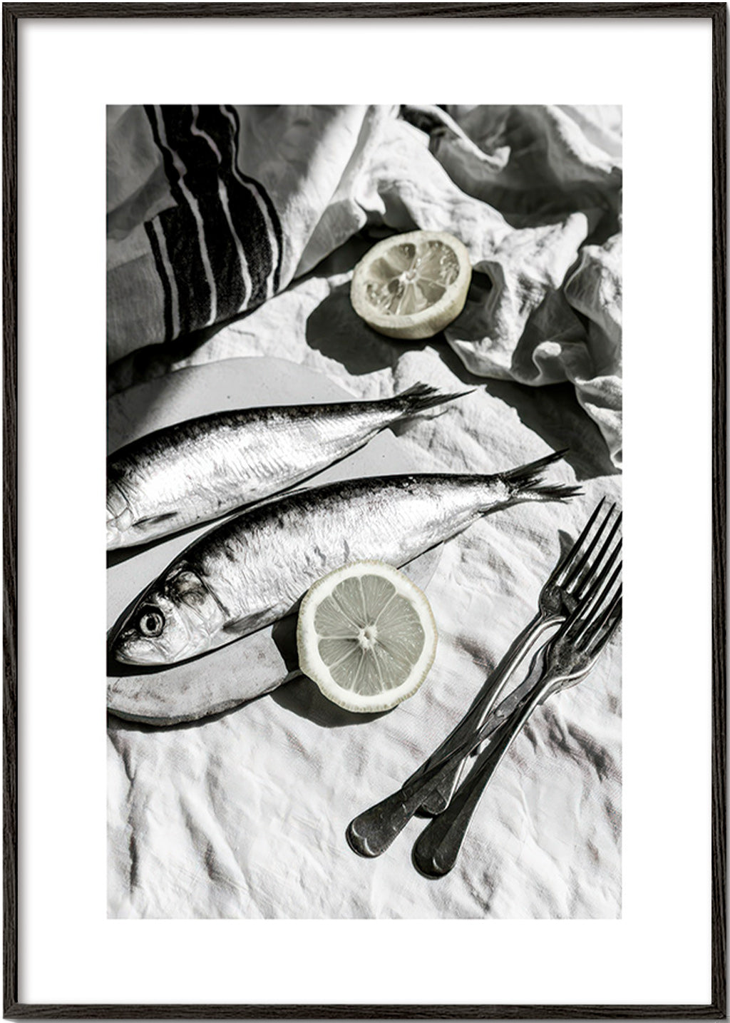 Art de cuisine: nature morte sardines et citron noir et blanc