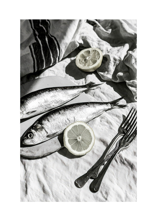 Art de cuisine: nature morte sardines et citron noir et blanc