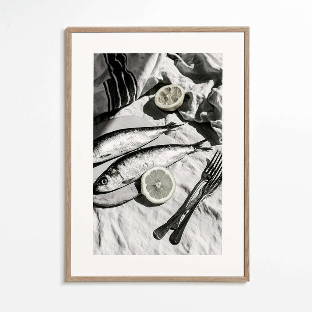 Art de cuisine: nature morte sardines et citron noir et blanc
